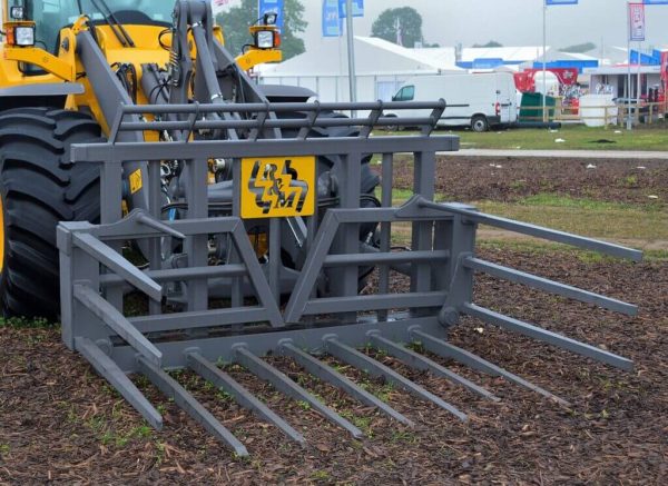 Folded up Silage Fork on a bucket